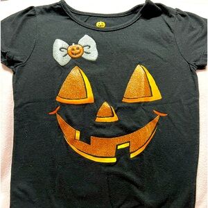 In good condition, Target Black Size 3T  Jack O Lantern T-Shirt.